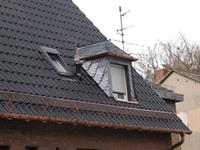 Sanierung eines Steildachs - Aufbau einer Dachgaube mit Schieferverkleidung