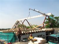 Sanierung und Holzbau - Aufstockung eines Flachdachs