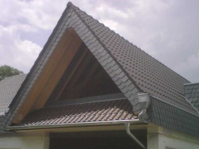 Aufstockung eines Flachdachs - das Ergebnis - Dachdecker Holzbau Sanierungen Zimmereibetrieb